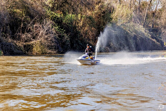 Enjoy the water at the Stanislaus River at River Cove in the City of  Riverbank.