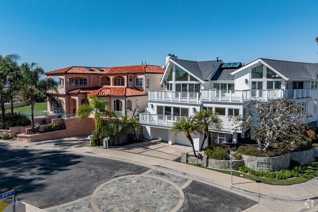 Spacious homes with ocean views and a vibrant Newport Heights lifestyle.