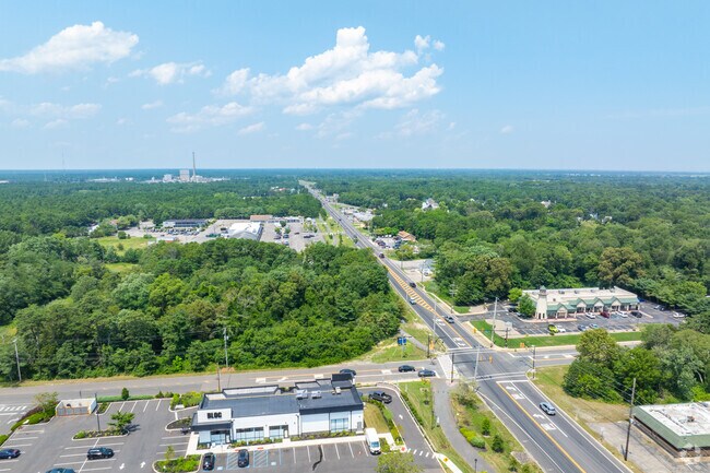Shopping centers and restaurants congregate around the main I-9 roadway.