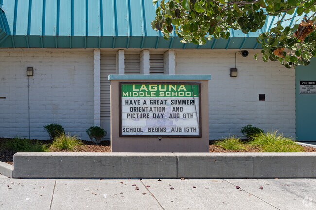 A lighted marquee at the entrance to Laguna Middle School informs Meadow Park parents of events.
