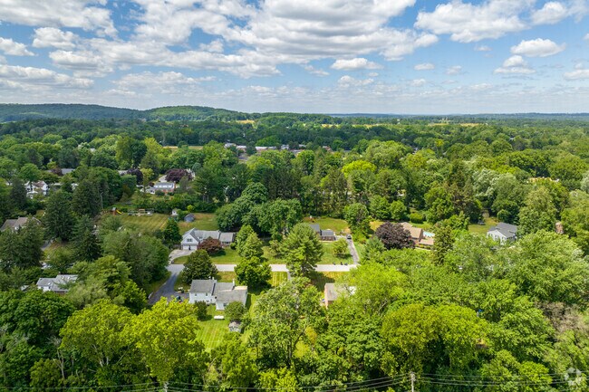 Rolling hills cradle single family homes with large lots in Chesterbrook.