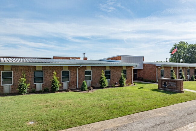 Emerson Academy has 62 students in enrollment.