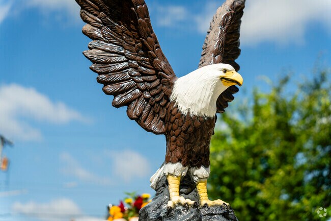 Many homes in the Oakman Grove neighborhood display statues or flags.