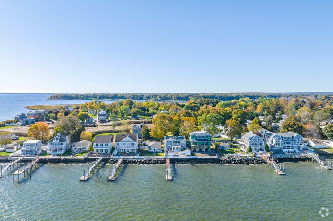 Aerial view of Potowomut and its shore-lined beach homes.