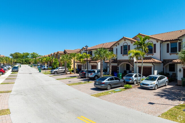 New Mediterranean-inspired townhouses are inside the Coral Lake neighborhood.