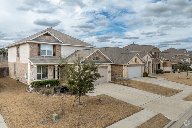 Many traditionally styled homes with limestone faces are available in Harris Branch.