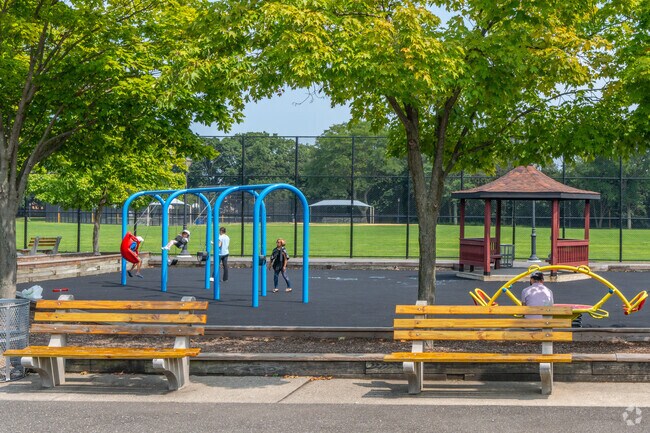 Take your children to the playground at John D. Caemmerer Park in Albertson.