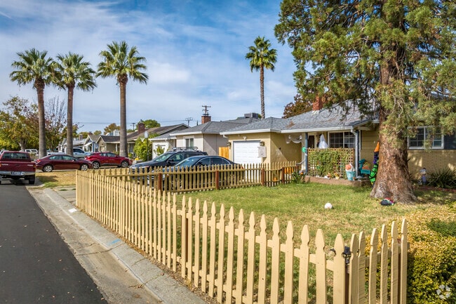 Rows of ranch-style homes with palm tree front yards are common in Fulton-El Camino.