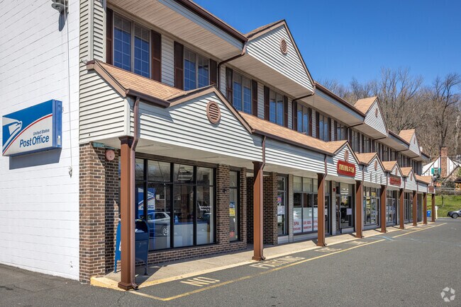 A typical retail strip in Watchung including a post office, nail salon and pizzeria.