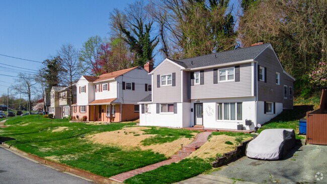 Two-story colonial inspired homes with roadside parking are mainstays in District Heights.