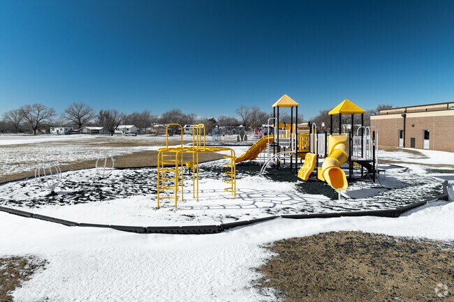 Kids can climb on the playground at Cleaveland Traditional College and Career Readiness Magnet.