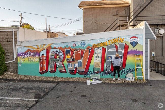 Local artist are hired to bring color to the city of Irwin.