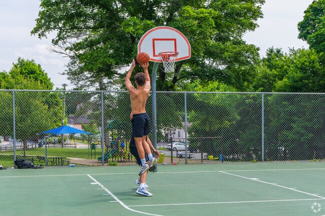 Play a game of friendly one-on-one on the basketball courts at Pomeworth Field near Lindenwood.
