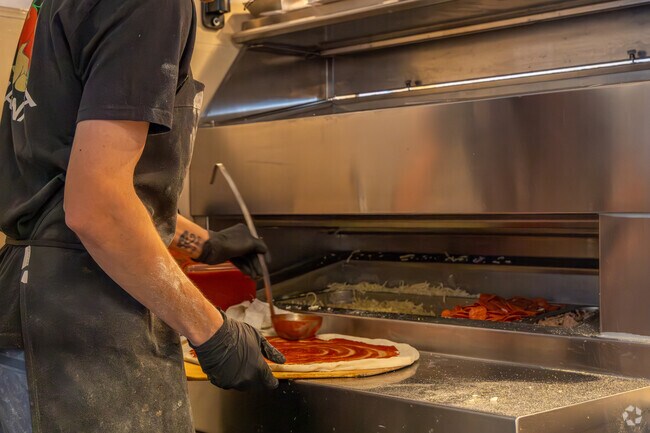 Bronx Pizza in Cimarróne uses fresh ingredients for your pizza.