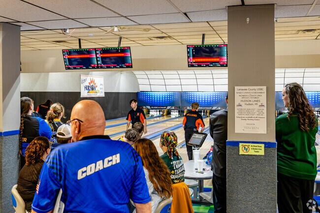 Hudson Lanes has family-friendly Cosmic Bowling and competitive adult and student leagues.