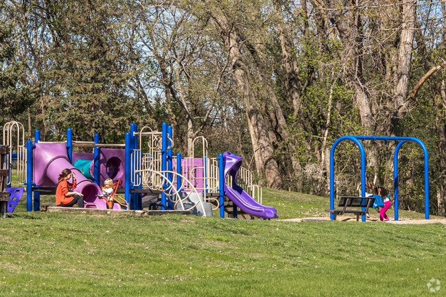 Neighborhood kids enjoy playing on the play structure at Innsbruck Park.