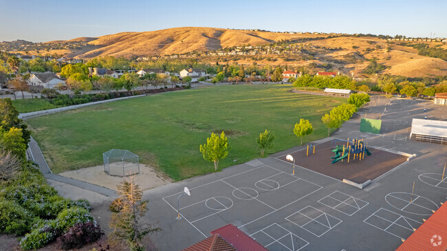 Students enjoy the playground and sports courts at James Franklin Smith Elementary.