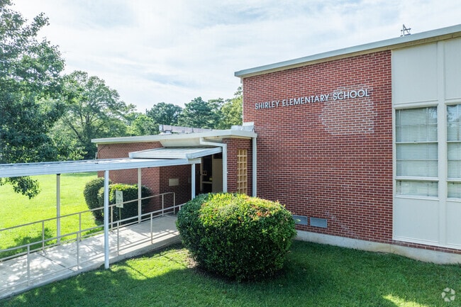 The school's facilities include playgrounds and classrooms equipped for interactive learning.