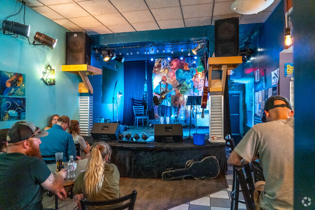 Sit at a table or the bar during Open Mic night at Wussow's Concert Cafe near Irving.