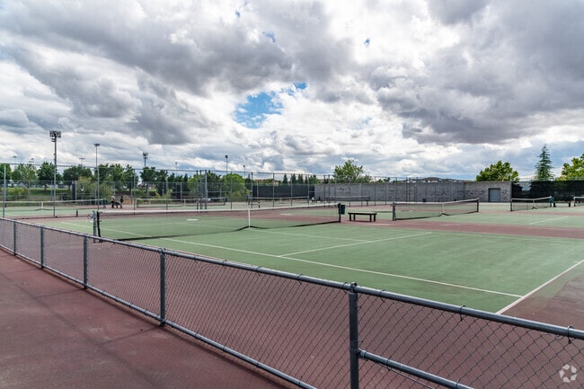 There are multiple tennis courts at Whitney High School.