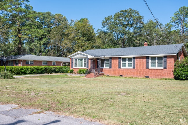 Rows of brick front ranch homes can be found all throughout Albion Acres.