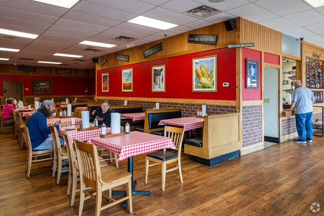 Grab a bite to eat at Hog Wild Pit BBQ in Chisholm Creek.