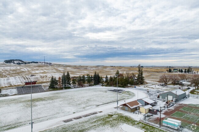 Reardan High features a football stadium behind the school.