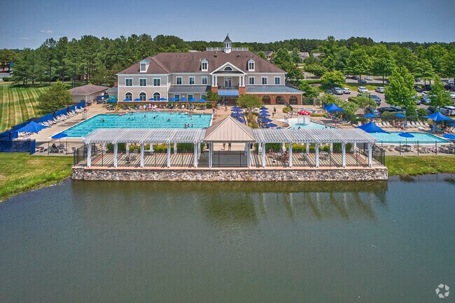 Take a swim at the Dominion Valley pool and enjoy the scenery.