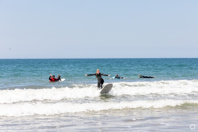 Learn to surf at Carpinteria Beach near Toro Canyon, Summerland.