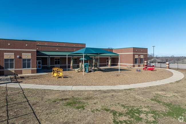 Lizzie Nell Cundiff Mcclure Elementary School provides a playground for students to enjoy.