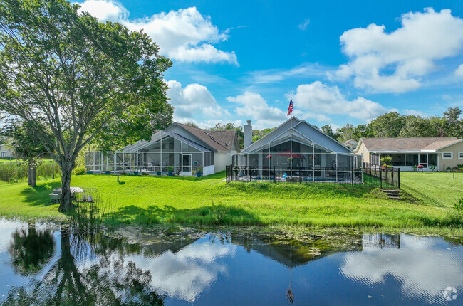 Some residents of the Groves community enjoy beautiful backyard waterfront views.