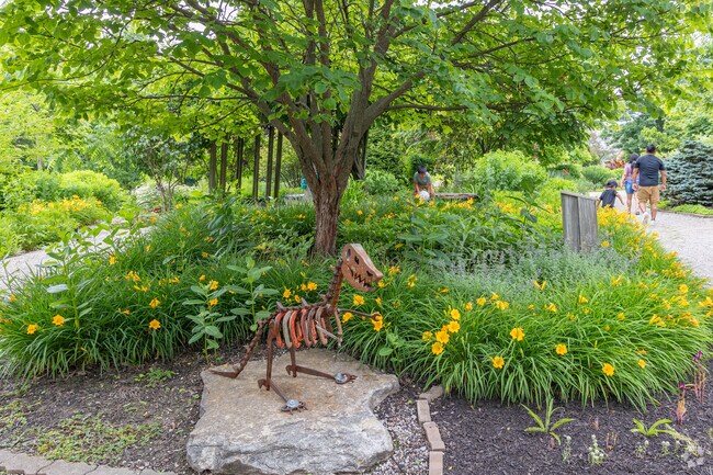 Metallic sculptures are scattered throughout Floral Paradise Gardens in Delhi Park.