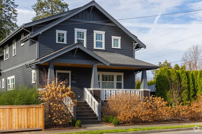 A beautiful family home in the Snoqualmie neighborhood with steps leading to the front door.