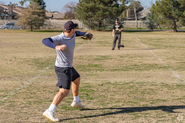 Two college pitchers hone their skills at one of the parks near Fox Run.