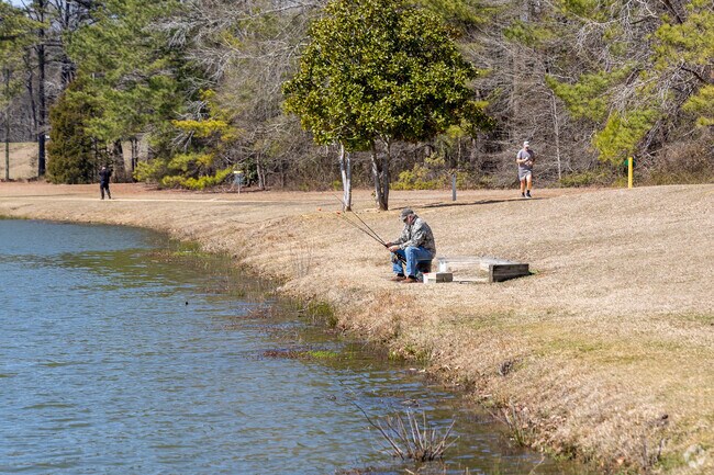 Luther Britt Park is a 142-acre park in Lumberton with trails around 2 lakes, plus playground equipment & picnic facilities.