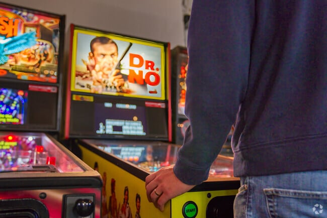 Residents enjoy the pinball machines at Helltown Brewery near Chartiers Township.