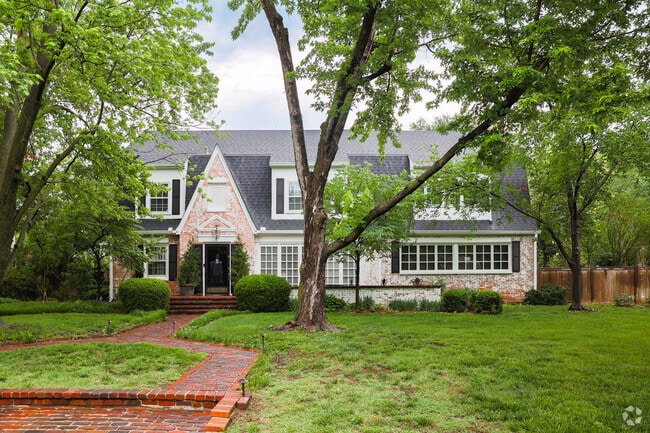 Here is a great looking red brick home in Eastborough with large windows to provide lots of natu