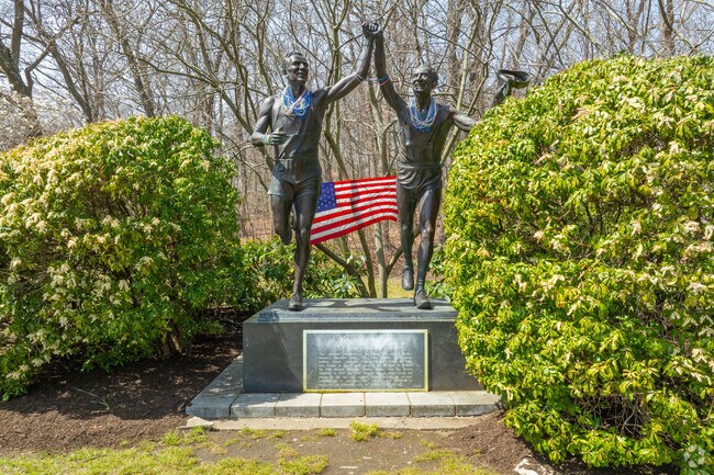 Learn about historical figures like runner Johnny Kelley in Newton Center.