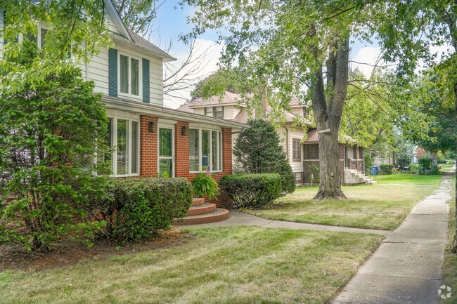 Rows of beautiful homes with sunrooms can be found near parks in Roselawn.