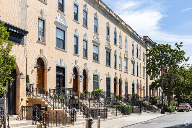 Classic meets contemporary, revitalized brick townhouses in Strivers' Row.