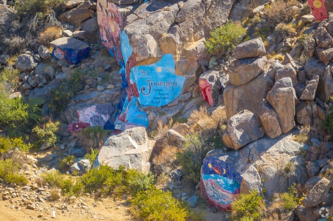 Roy Purcell's murals are found deep into the mountains that sit behind Chloride.