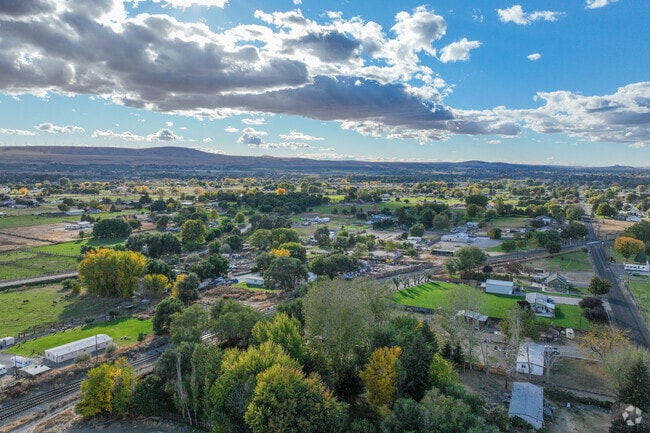 Aerial view of Finley showcases its peaceful rural setting and open spaces.