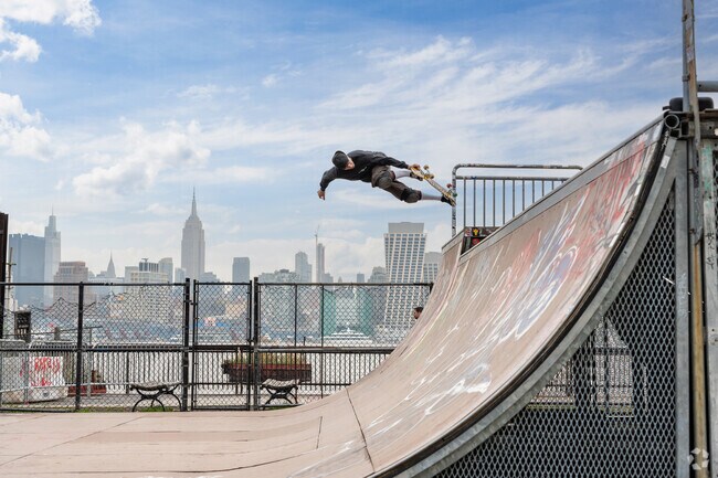 You can see the New York Skyline from Castle Point Skatepark in Hoboken, NJ.