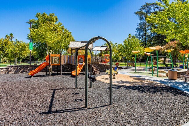 Centennial Park playground draws families in Downtown Madera.