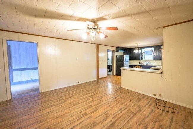 Open kitchen that flows into dining room.