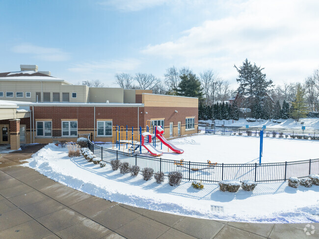Students enjoy playing on the playground for recess.