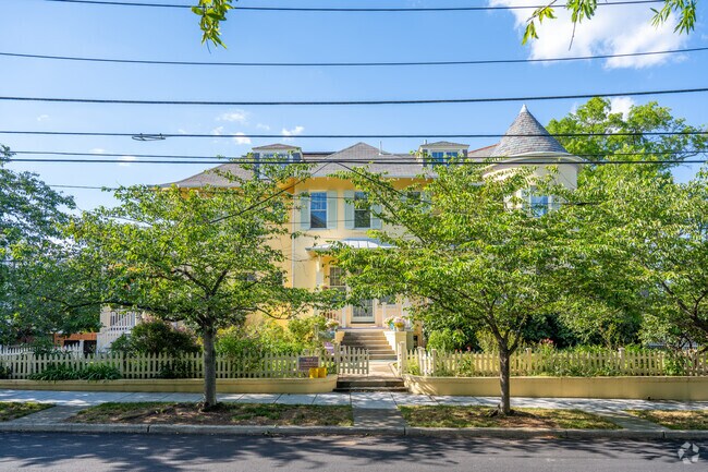 A spectacular yellow Queen Anne with a turret in Cleveland Park.