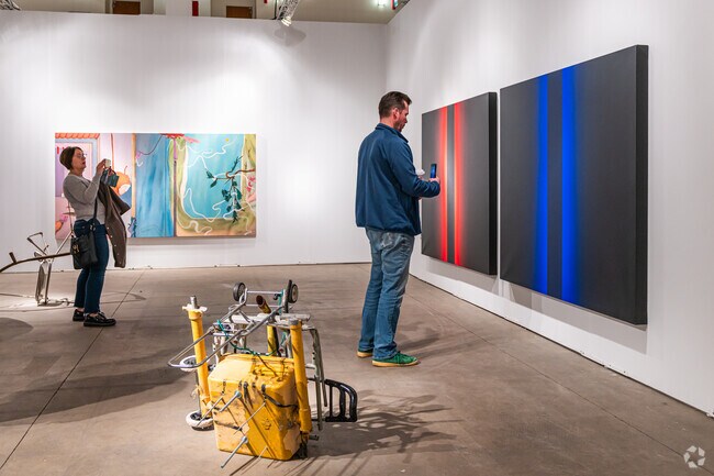 Visitors enjoy photographing the art at EXPO Chicago in Streeterville.