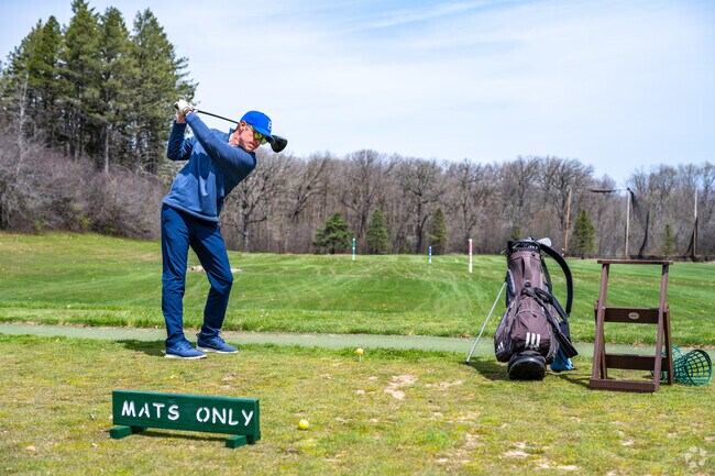 Work on your swing at the driving range at Brown Deer Park in River Edge.