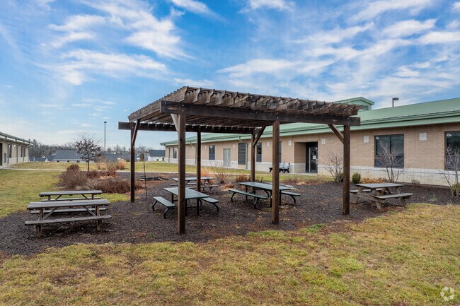 The courtyard behind Duello Elementary School has an outdoor classroom.